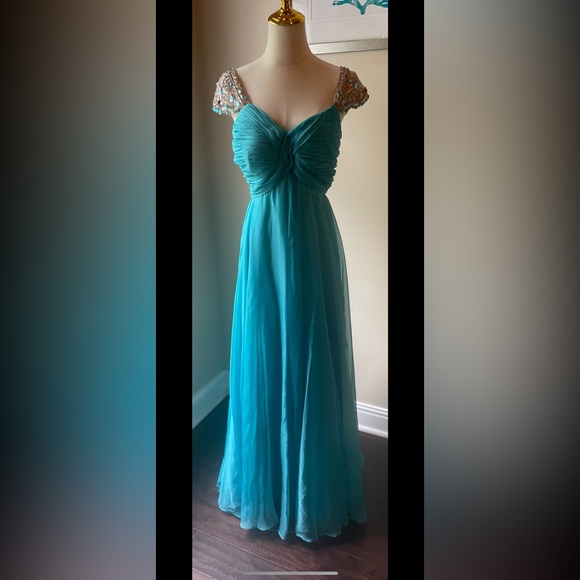 122 Sherri Hill Blue Backless Gown with Embellishments - Picture 5 of 8